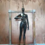 Mannequin home decor lamp with unique metallic inspired design front view